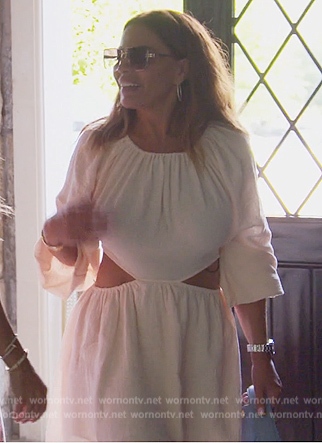 Dolores' white cutouts dress and bag on The Real Housewives of New Jersey