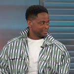 Dule Hill’s striped jacket on Access Hollywood