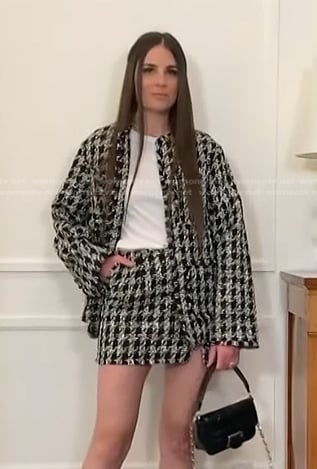 Erica Wark’s black plaid tweed jacket and skirt on Access Hollywood