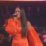 Holly Brand’s orange off-shoulder mini dress on The Voice