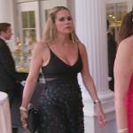 Jackie’s black floral applique dress on The Real Housewives of New Jersey