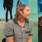 Jake McDorman’s green knit polo on Access Hollywood