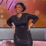 Jennifer’s black ruffle hem midi dress on The Jennifer Hudson Show