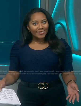 Kay Angrum’s navy ruched sleeve top on NBC News Daily