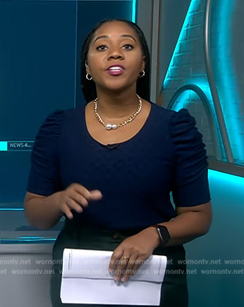 Kay Angrum's navy ruched sleeve top on NBC News Daily