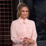 Keltie’s pink ruffle front shirt and mini skirt on E! News