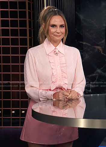 Keltie’s pink ruffle front shirt and mini skirt on E! News