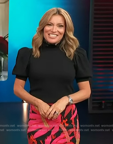 Kit’s palm print skirt and top on Access Hollywood