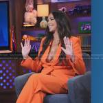 Kristen Doute’s orange wrap blazer and pants on E! News