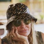 Leah’s black Versace logo hat on The Real Housewives Ultimate Girls Trip