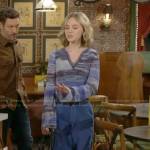 Lucy’s blue striped v-neck sweater and blue cargo pants on The Young and the Restless