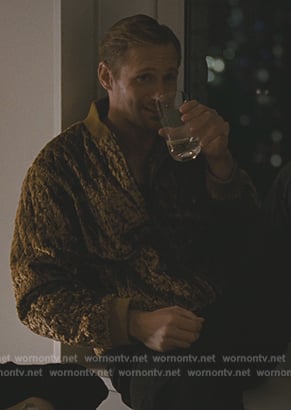 Lukas’s gold velvet quilted bomber jacket on Succession