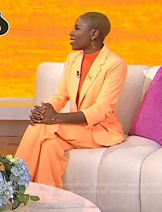 Luvvie Ajayi’s orange ruched blazer and pants by Today