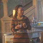 Malika’s black and brown striped dress on Good Trouble