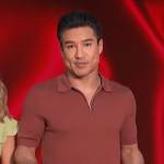 Mario’s brown zip polo on Access Hollywood