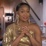 Marlo’s gold metallic confessional dress on The Real Housewives of Atlanta