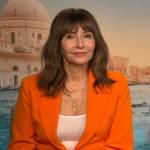 Mary Steenburgen’s orange chain detail blazer on Access Hollywood