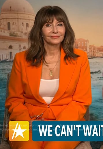 Mary Steenburgen’s orange chain detail blazer on Access Hollywood