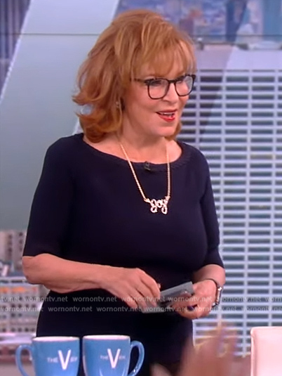 Joy’s navy braided trim sweater top on The View