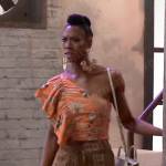 N’neka’s orange printed one-shoulder top on General Hospital