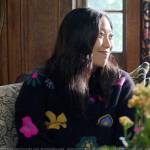 Nora’s black floral sweater on Awkwafina is Nora From Queens