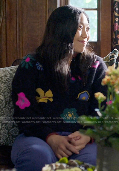Nora's black floral sweater on Awkwafina is Nora From Queens