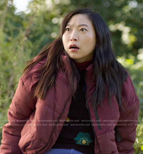 Nora's burgundy puffer jacket with corduroy patches on Awkwafina is Nora From Queens