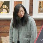 Nora’s green quilted jacket on Awkwafina is Nora From Queens