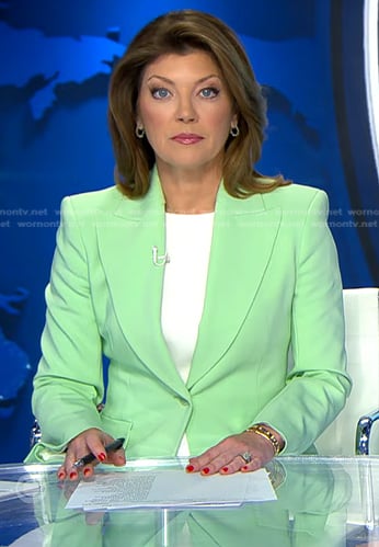 Norah’s mint green pant suit on CBS Evening News