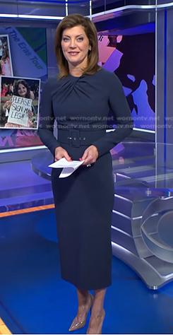 Norah’s navy belted sheath dress on CBS Evening News