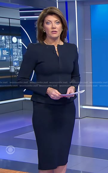 Norah’s navy peplum jacket on CBS Evening News