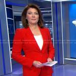 Norah's red suit on CBS Evening News