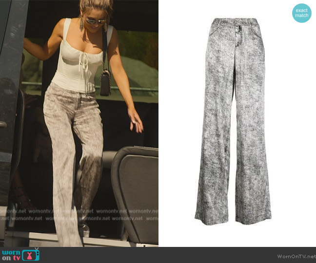 Retrofete Verona flared acid-wash jeans worn by Chrishell Stause on Selling Sunset