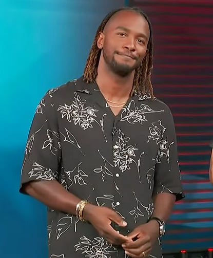 Scott’s black floral shirt on Access Hollywood