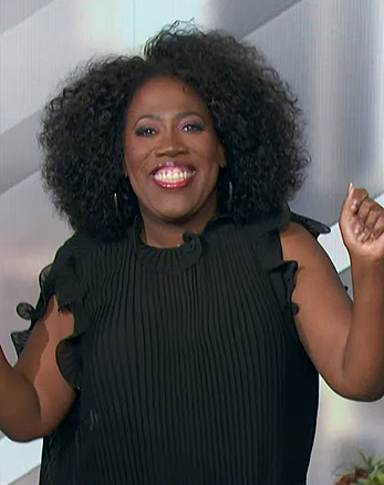 Sheryl's black pleated ruffle top on The Talk