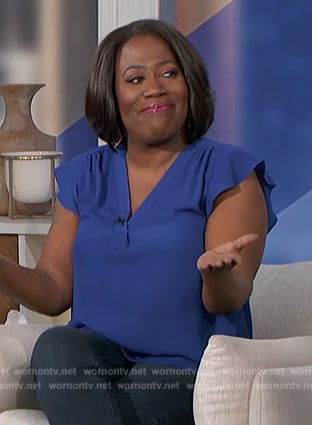 Sheryl’s blue flutter sleeve top on The Talk