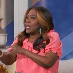 Sheryl’s coral popcorn top on The Talk