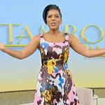 Tamron’s floral print sleeveless dress on Tamron Hall Show