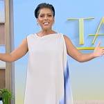 Tamron’s white asymmetric tie dye dress on Tamron Hall Show