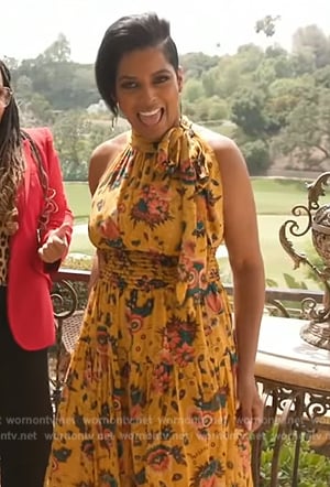 Tamron’s yellow floral print halter dress on Tamron Hall Show