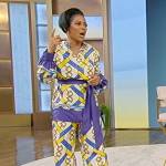 Tamron’s blue horsebit print blouse and pants on Tamron Hall Show