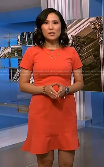 Vicky’s orange ruffle hem mini dress on NBC News Daily