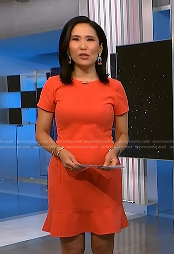 Vicky’s orange ruffle hem mini dress on NBC News Daily