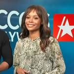 Zuri’s green animal print tie neck blouse on Access Hollywood