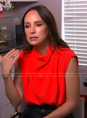 Catt Sadler's red sleeveless top on Access Hollywood