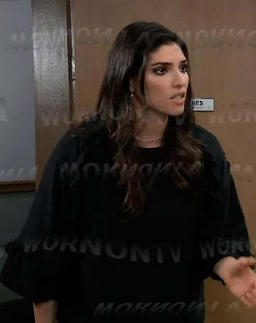 Brook Lynn’s black ruffle sleeve blouse on General Hospital