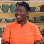 Candi Carter’s orange smocked top on CBS Mornings