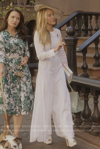 Carrie's white lace trim jumpsuit on And Just Like That