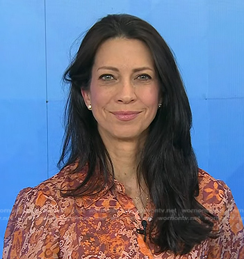 Dr. Natalie Azar's orange abstract print blouse on Today