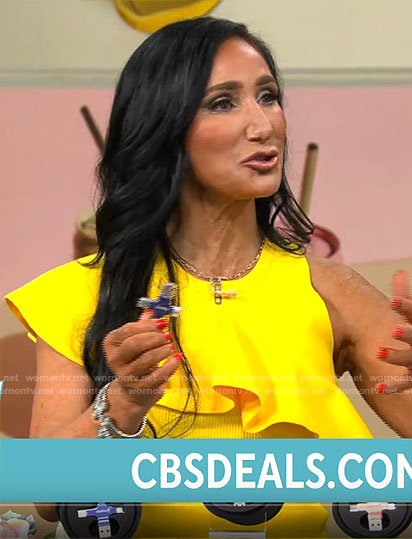 Elizabeth Werner’s yellow ruffled top on CBS Mornings